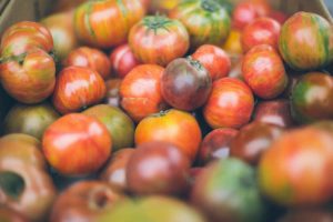 Unpretty tomatoes are just the start of how we look at reducing surplus food. Photo by Anda Ambrosini on Unsplash
