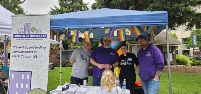 Council for the Homeless staff tabling a local PRIDE event; 28% of LGBTQI+ youth reported experiencing homelessness or housing instability at some point in their lives.